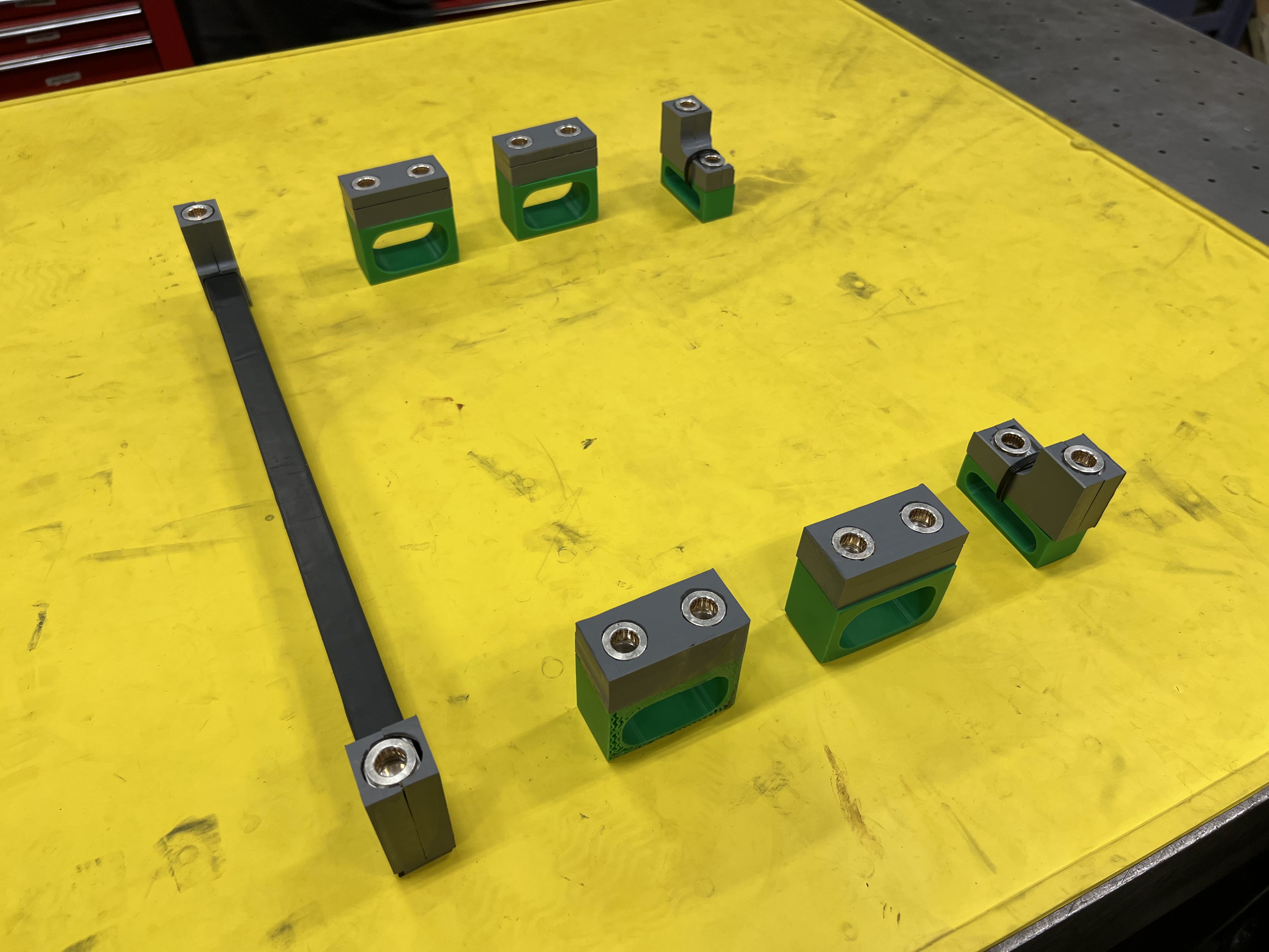 Maintenance-plug hardware, machined from metal and coated in plastic for electrical isolation